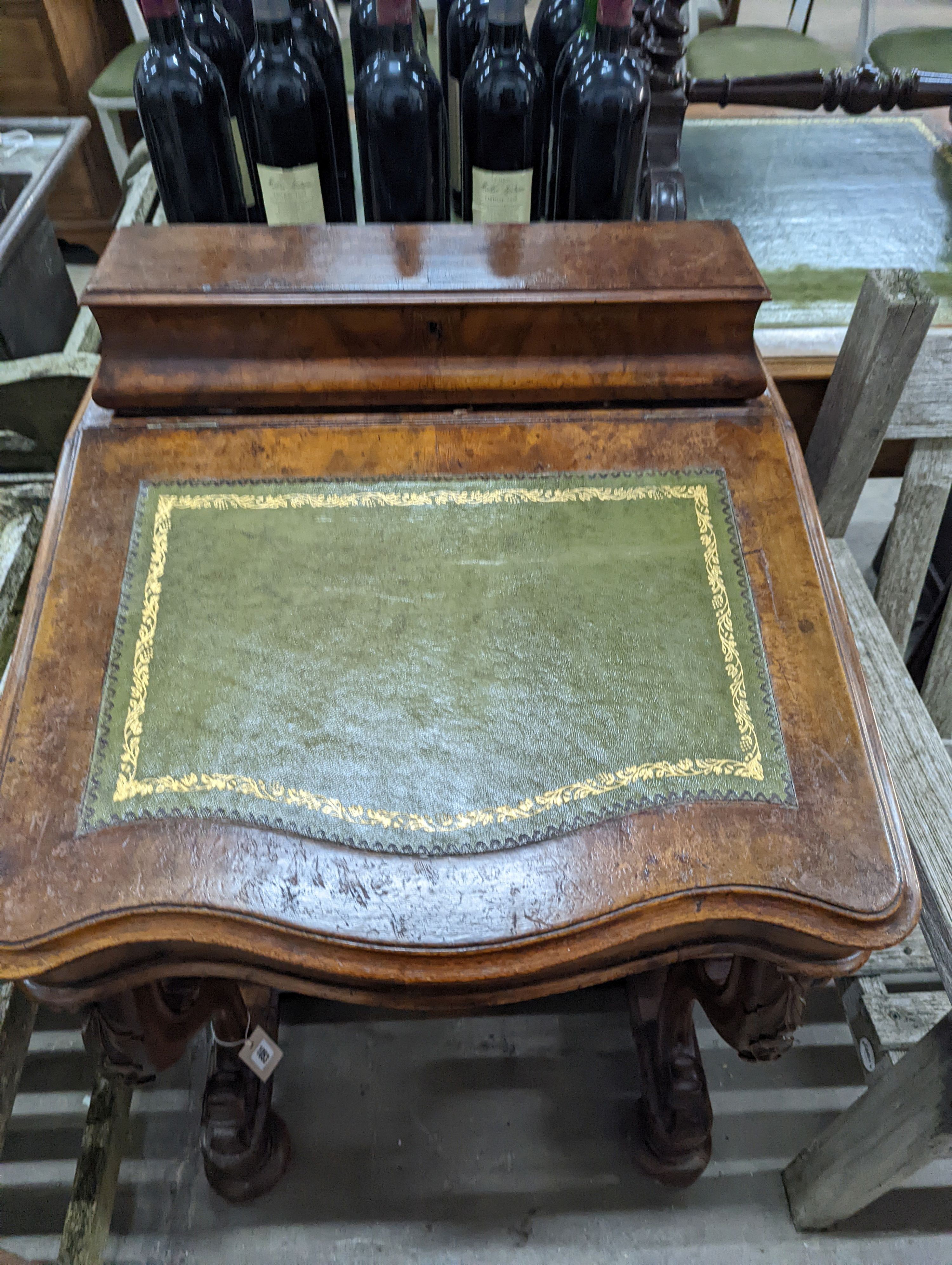 A Victorian walnut Davenport, width 57cm, depth 58cm, height 90cm